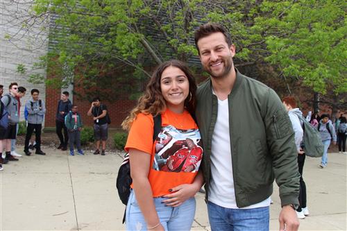 BHS alum Chris Bukowski visits with a "Bachelor" fan and current BHS student 